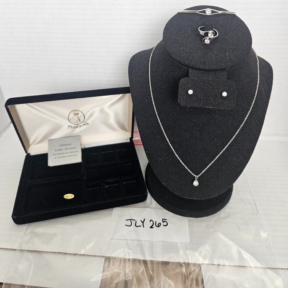 NIKOLAS JEWELERS SILVER TONED CUBIC ZIRCONIA NECKLACE, EARRINGS, RING AND BRACEL